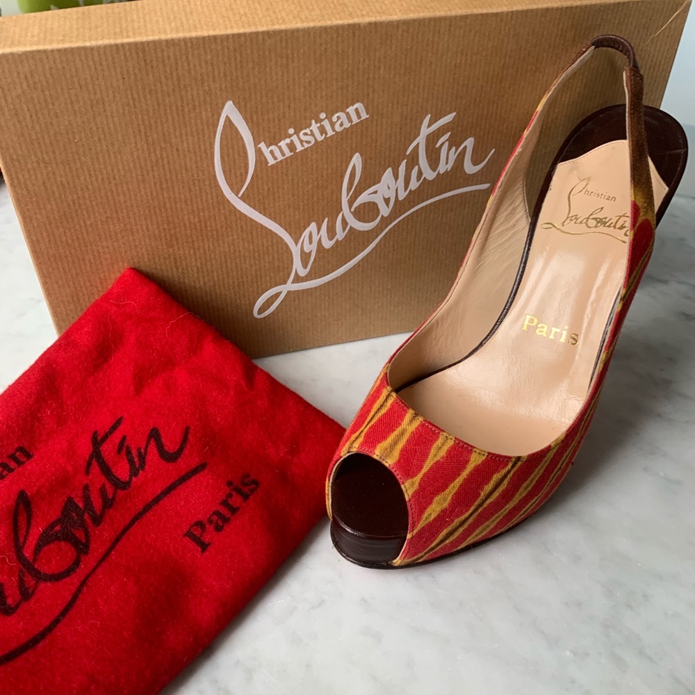 Louboutin peep toe pumps